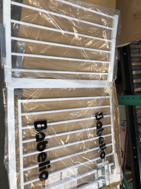Photo 1 of BABELIO Metal Baby Gate Dog Gate 29-48 Inch Extra Wide Pet Gate for Stairs and Doorways