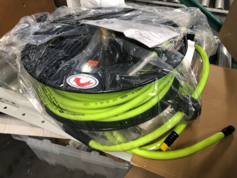 Photo 2 of ***USED/DAMAGED*** Flexzilla Open Face Retractable Air Hose Reel, 3/8 in. x 50 ft., Heavy Duty, Lightweight, Hybrid, ZillaGreen - L8611FZ 3/8" (inches) x 50' (feet) Hose Reel