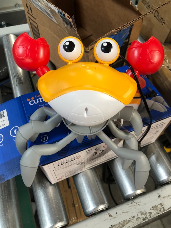 Photo 2 of FEELGUY Crawling Crab Baby Toy with Music (Orange)