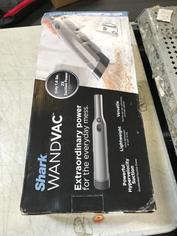 Photo 2 of Shark WV201 WANDVAC Handheld Vacuum, Lightweight at 1.4 Pounds with Powerful Suction, Charging Dock, Single Touch Empty and Detachable Dust Cup Graphite (USED)(DIRTY)