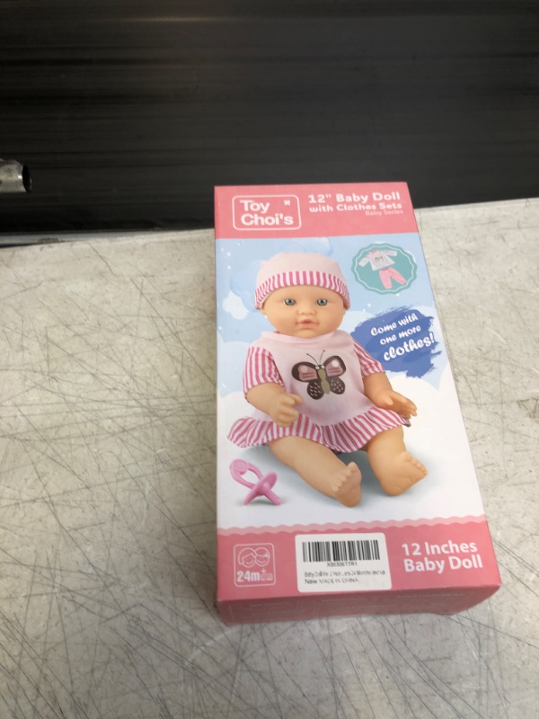 Photo 1 of 12 inch baby doll with clothes 