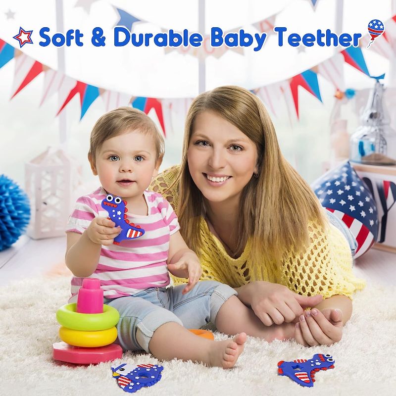 Photo 1 of 4th Of July Silicone Baby Teething Toys For Babies 6-12 Months, Red White & Blue Dinosaur Baby Teether Toy Teething Pain Relief Baby Chew Toy 3 Months, Infant Toys For Boys Girls 4th Of July Gifts
