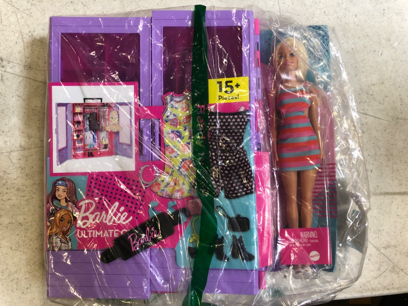 Photo 2 of Barbie Fashionistas Ultimate Closet Portable Fashion Toy with Doll, Clothing, Accessories and Hangers, Gift for 3 Years Old and Up Purple Closet with Doll