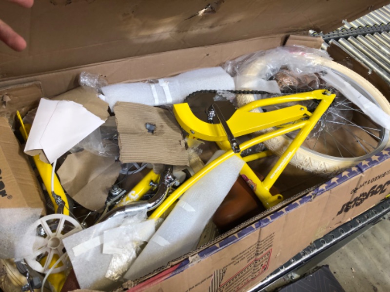 Photo 1 of yellow and brown bike 