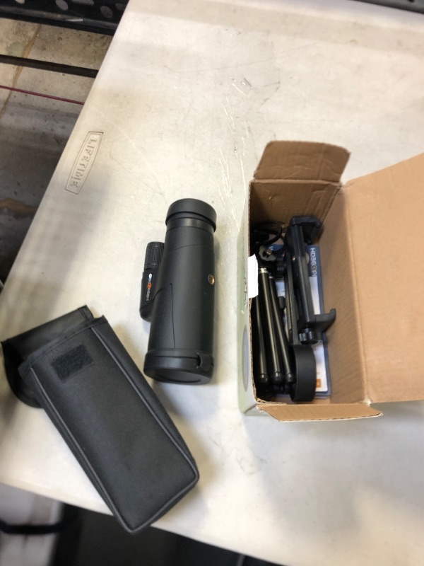 Photo 1 of Monocular Telescope 12X50 Outdoor Telescope with Smartphone Adapter for Stargazing, Birdwatching, Hunting, Dust-Proof, Waterproof HD Monocular for adults with Phone Holder and Metal Tripod By hd360pro