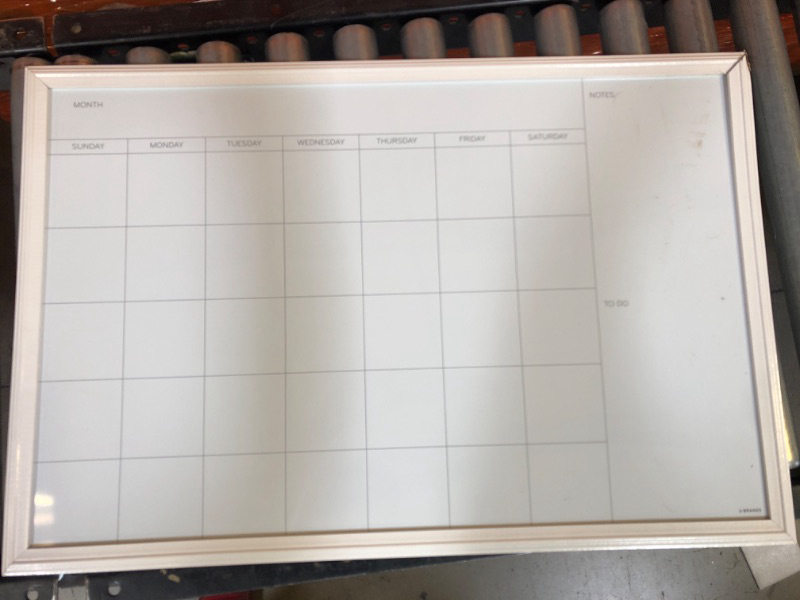 Photo 2 of U Brands Magnetic Dry Erase Calendar Board, 20 x 30 Inches, White Wood Frame *** CORNER OF FRAME HAS A SMALL SCRATCH ***
