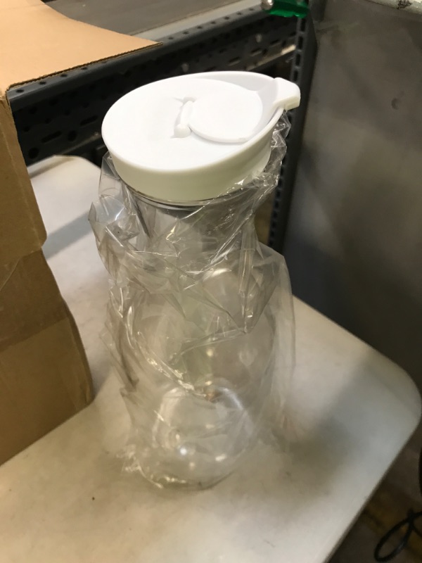 Photo 1 of 1 Large 50 Oz Water Carafe with White Flip Top Lid, Clear Plastic Juice Jar Containers, Mimosa Bar Beverage Pitcher BPA Free 