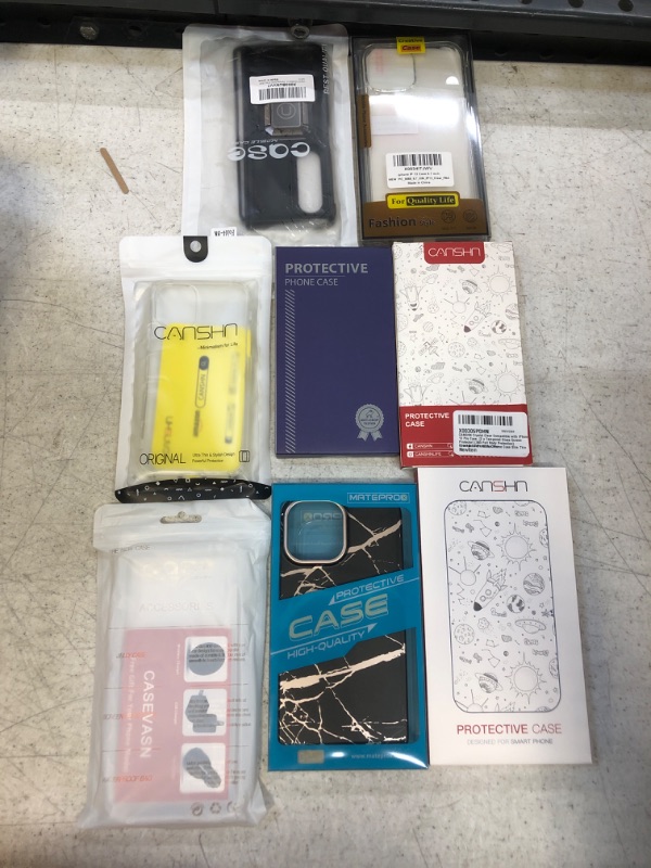 Photo 1 of 8 DIFFERENT IPHONE CASES 
