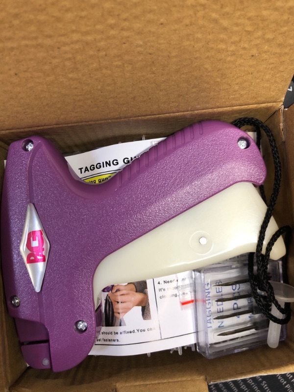 Photo 2 of PAG Standard Tagging Gun Price Tag Attacher Gun for Clothing with 5 Needles and 2000 2" Barbs Fasteners, Purple