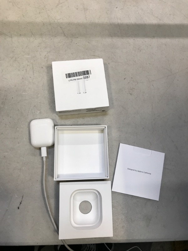 Photo 2 of AirPods with Charging Case - missing cord 