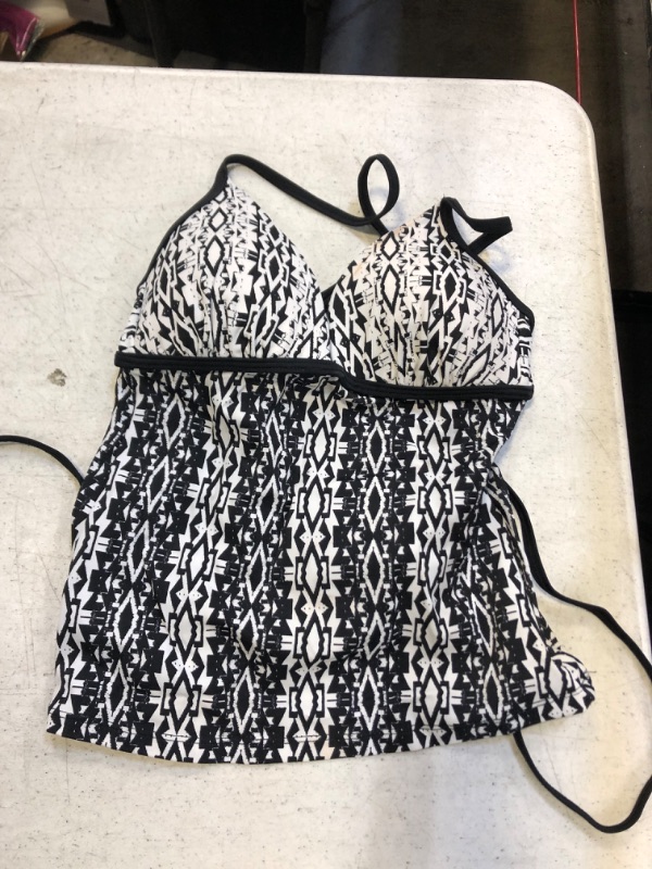 Photo 1 of WOMENS SWIMTOP
SIZE SMALL (MINOR STAINS)