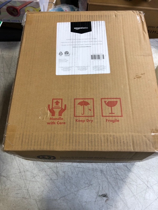 Photo 1 of Amazon Basics 8-Sheet Cross Cut Paper Shredder and Credit Card Shredder with 4.1 Gallon Bin
