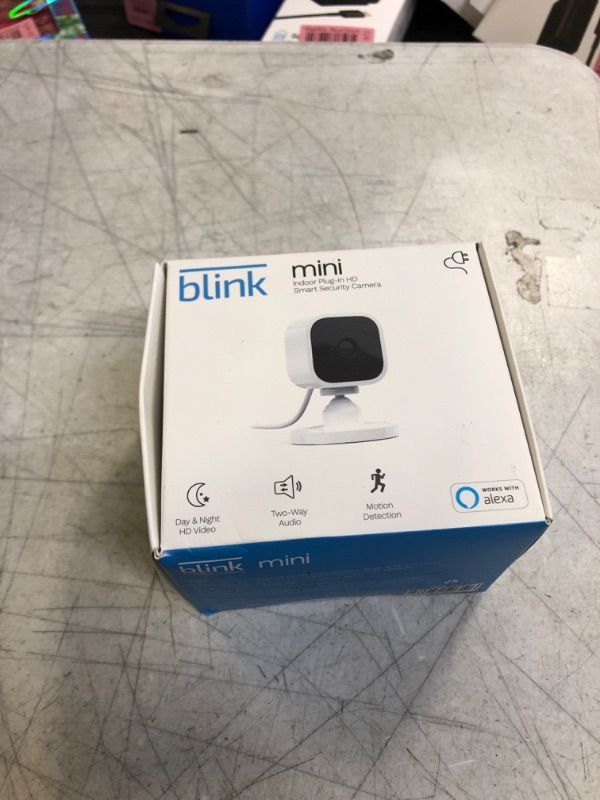 Photo 2 of Blink Mini – Compact indoor plug-in smart security camera, 1080p HD video, night vision, motion detection, two-way audio, easy set up, Works with Alexa – 1 camera (White) White 1 Camera FACTORY SEALED)