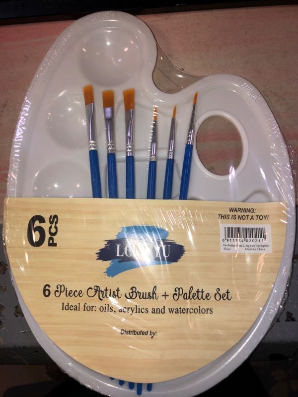 Photo 1 of childrens 6 piece paint brush and palette set