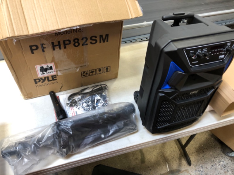 Photo 2 of Portable Bluetooth PA Speaker System - 400W Outdoor Bluetooth Speaker Portable PA System w/Microphone in, Party Lights, MP3/USB SD Card Reader, FM Radio, Rolling Wheels - Mic, Remote - Pyle PPHP82SM
OPEN BOX ITEM