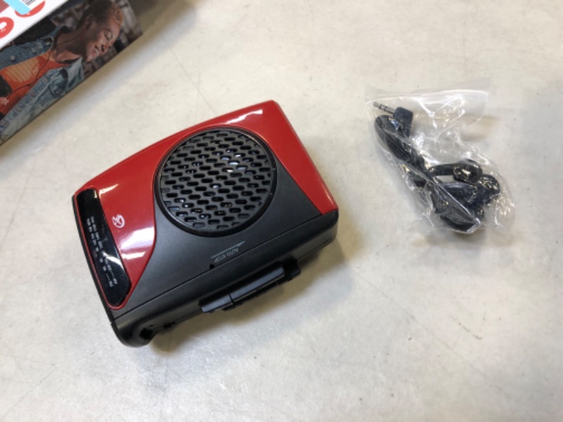 Photo 2 of GPX Portable Cassette Player, 3.54 x 1.57 x 4.72 Inches, Requires 2 AA Batteries - Not Included, Red/Black (CAS337B) Black/Red