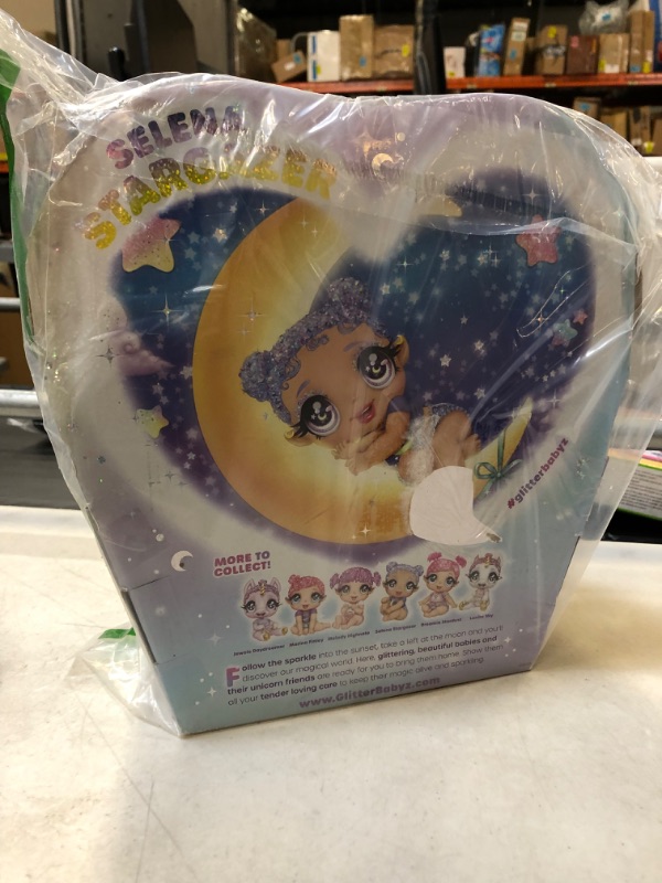 Photo 3 of MGA Entertainment Glitter Babyz Selena Stargazer Baby Doll 3 Magical Color Changes, Pastel Purple Glitter Hair, Moon & Stars Outfit, Diaper, Bottle, Pacifier Accessories Gift for Kids, Ages 3 4 5+