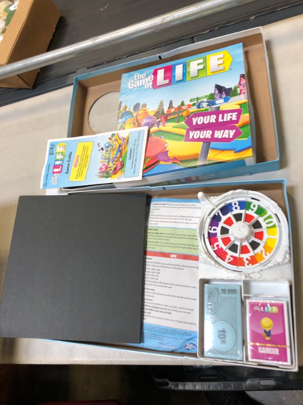 Photo 2 of Hasbro Gaming The Game of Life Game, Family Board Game for 2-4 Players, Indoor Game for Kids Ages 8 and Up, Pegs Come in 6 Colors