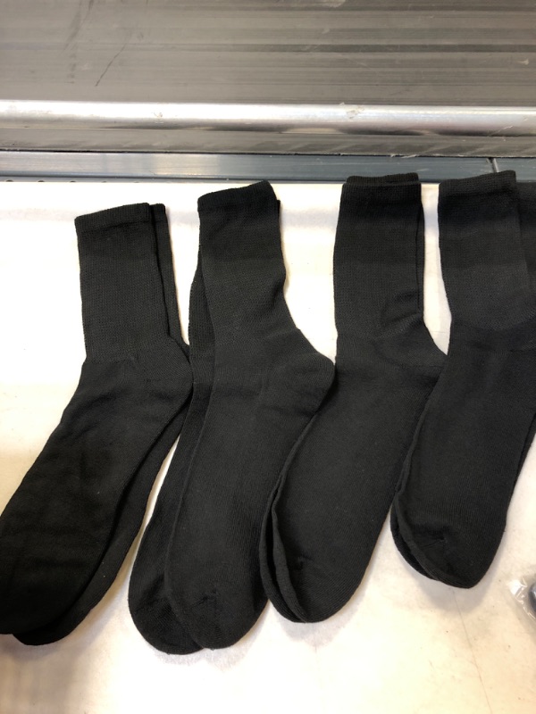 Photo 1 of 4 PAIRS OF BLACK SOCKS 