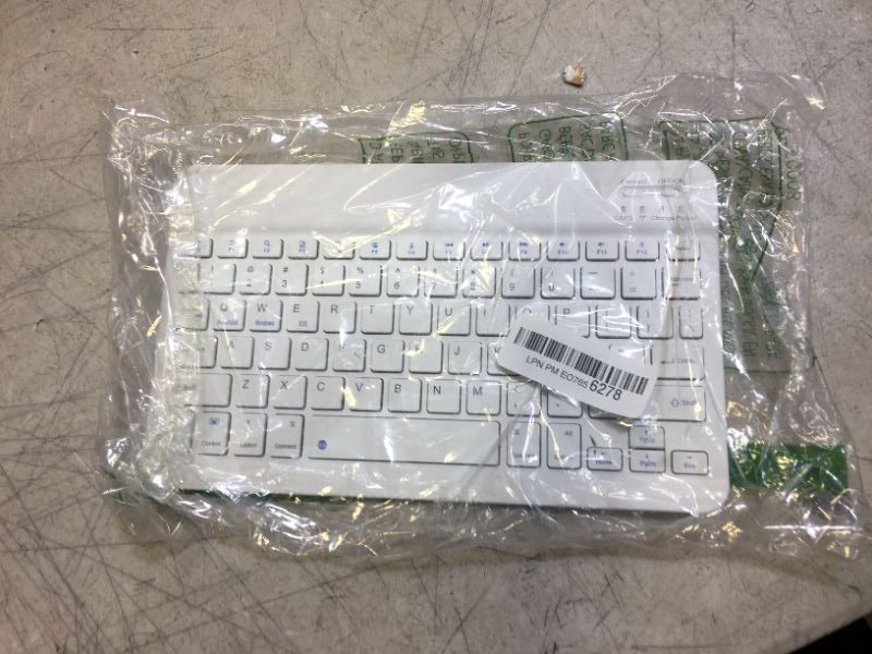 Photo 1 of GENERIC WHITE WIRELESS KEYBOARD