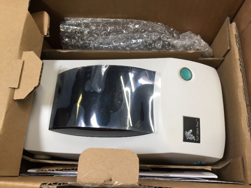 Photo 2 of ZEBRA TLP2824 Plus Thermal Transfer Desktop Monochrome Printer Print Width of 2 in Serial and USB Port Connectivity 282P-101110-000