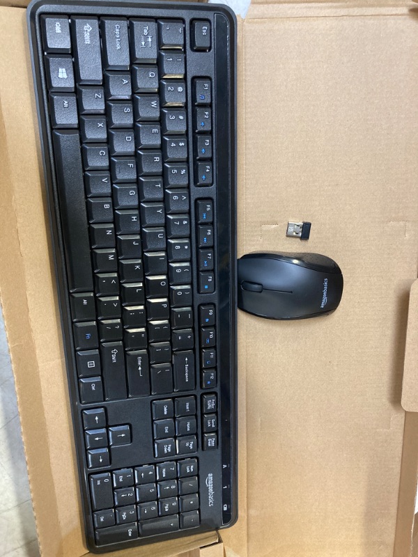 Photo 2 of Amazon Basics Wireless Computer Keyboard and Mouse Combo - Quiet and Compact - US Layout (QWERTY)