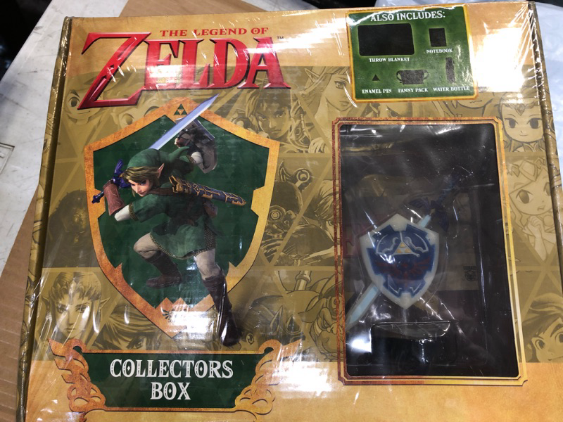 Photo 2 of CultureFly Legend of Zelda Collector's Box | Contains 6 Exclusive Items Including Map Blanket, Link Pin, Gold Hylian Shield Vinyl and More ZL2020BX4WT