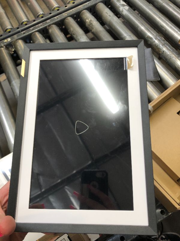 Photo 1 of Nixplay 10.1 inch Touch Screen Smart Digital Picture Frame with WiFi (W10P) - Black Classic Matte - Unlimited Cloud Photo Storage - Share Photos and Videos Instantly via Email or App - Preload Content 10 inch (Classic Black)