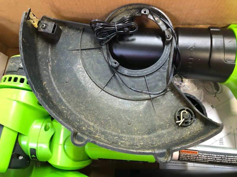 Photo 1 of GREENWORKS 24V CORDLESS STRING TRIMMER AND BLOWER COMBO