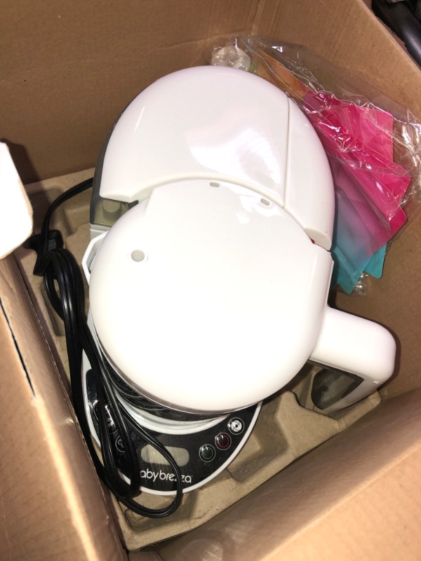 Photo 1 of Baby Brezza One Step Baby Food Maker Deluxe – Cooker and Blender in One to Steam and Puree Baby Food for Pouches - Make Organic Food for Infants and Toddlers - Set Includes 3 Pouches and 3 Funnels