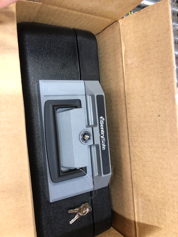 Photo 1 of SentrySafe Fireproof Safe Box with Key Lock, Chest Safe with Carrying Handle to Secure Valuables and Jewelry, 0.25 Cubic Feet, 6.3 x 15.3 x 12.1 Inches, 1160 0.25 cu. ft. fire resistant box Box