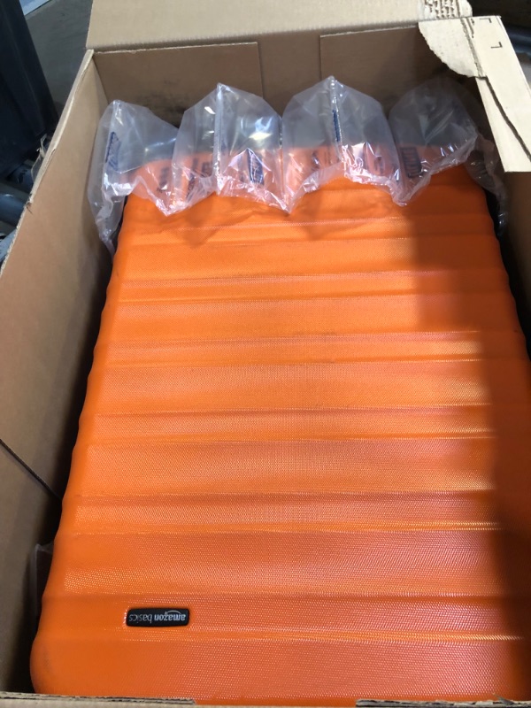 Photo 2 of Amazon Basics 30-Inch Hardside Spinner, Orange