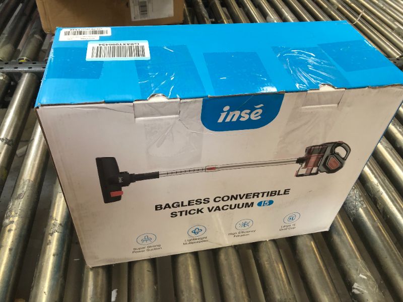 Photo 1 of bag less stick vacuum 