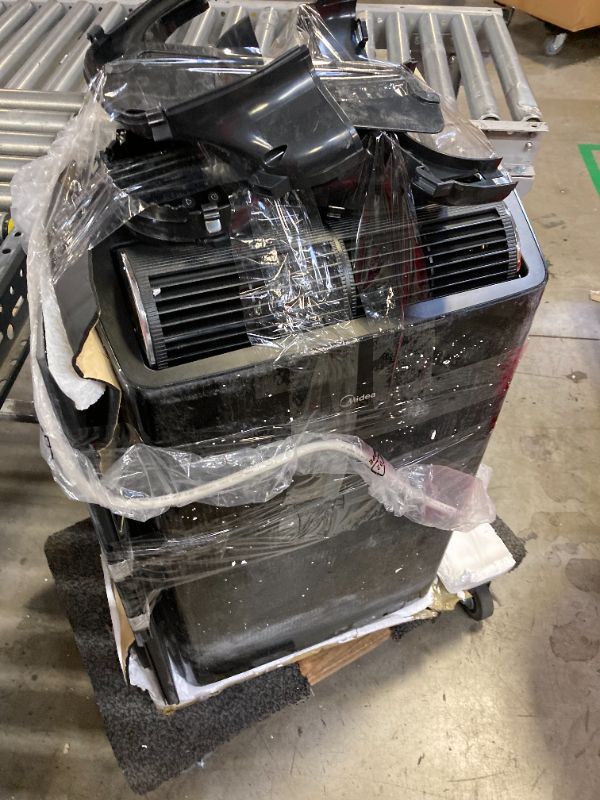 Photo 1 of Midea Duo 12,000 BTU (10,000 BTU SACC) HE Inverter Ultra Quiet Portable Air Conditioner, Cools up to 450 Sq. Ft., Works with Alexa/Google Assistant, Includes Remote Control & Window Kit
