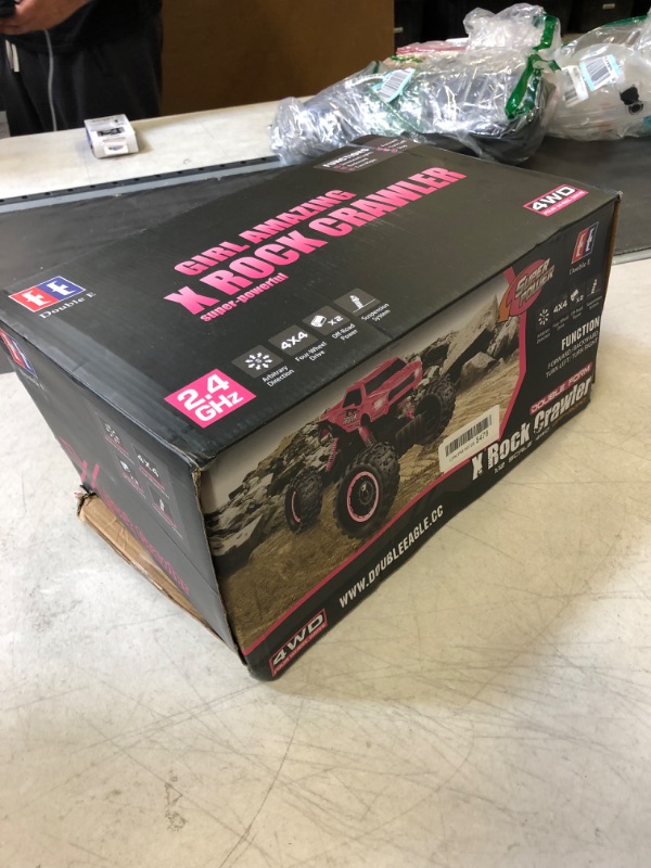 Photo 3 of DOUBLE E RC Cars Newest 1:12 Scale Remote Control Car with Rechargeable Batteries and Dual Motors Off Road RC Trucks