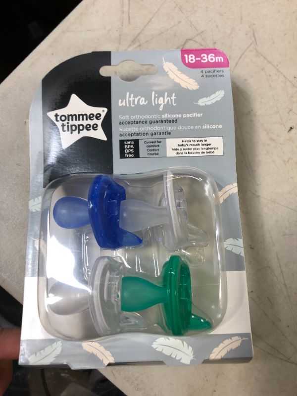 Photo 1 of Bundle of Tommee Tippee Ultra-Light Pacifier, Symmetrical One-Piece Design, BPA-Free Silicone Binkies, 6-18m, 4-Count + Ultra-Light Pacifier, One-Piece Design, BPA-Free Silicone Binkies, 0-6m, 4-Count 0-36m White + Purple + Rose + Green