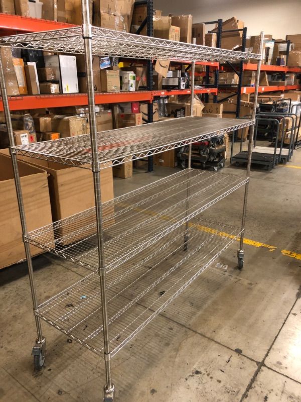 Photo 1 of 4 Tier Metal Shelving Unit 6FT X 76"   ITEM IS ASSEMBLED 