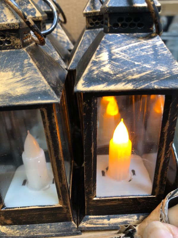 Photo 3 of 12 Set Candle Lantern Mini Lanterns with Flickering LED Candle Vintage Lantern 5.5'' Decorative Hanging Candle Lantern Battery Powered Decorative Lantern for Halloween Table Wedding Decor (Bronze)