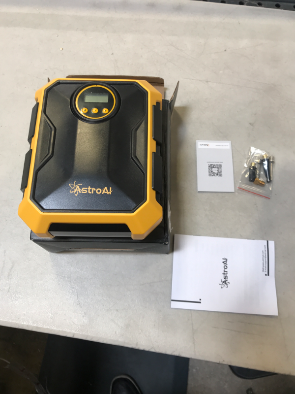 Photo 1 of AstroAI Air Compressor Tire Inflator 12V DC Portable Air Compressor Auto Tire Pump 100PSI with LED Light Digital Air Pump for Car Tires Bicycles Other Inflatables Yellow