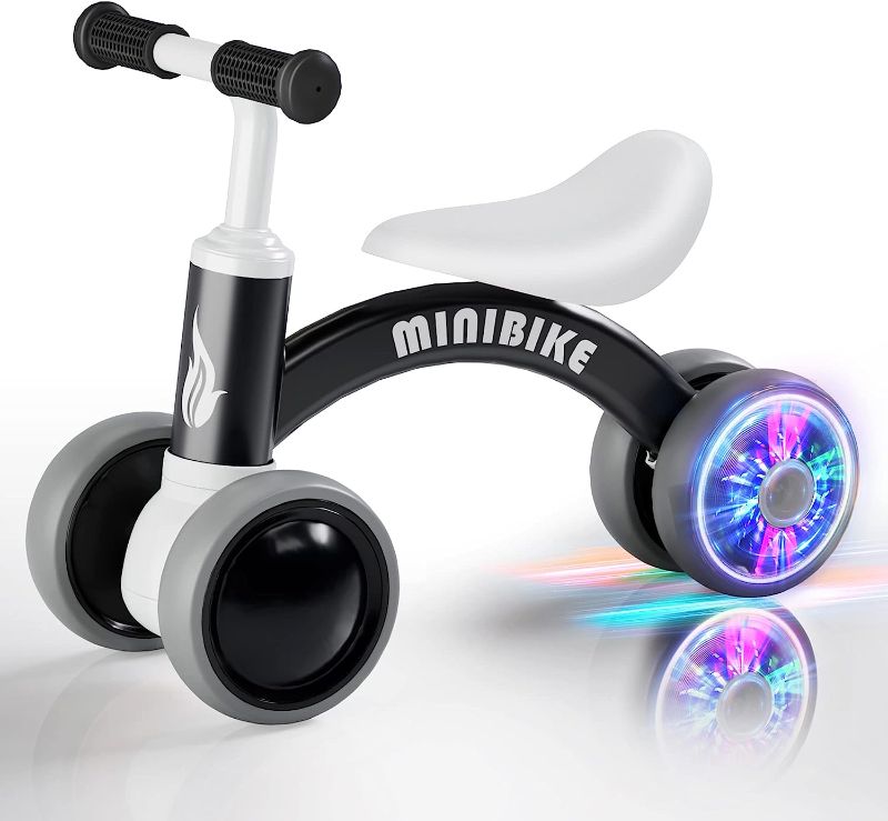 Photo 1 of Cawhad Colorful Lighting Baby Balance Bike for 1-3 Year Old Boy and Girl Gift,10-36 Month Toddler Balance Bike,Colorful Lighting Rear Wheel Design, No Pedal 4 Silence Wheels,First Birthday Gifts.
