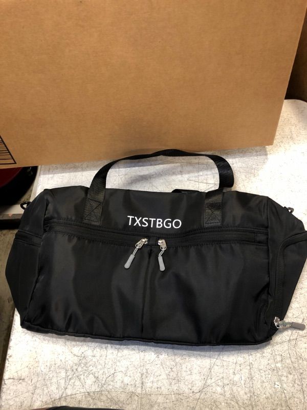 Photo 1 of Black travel bag