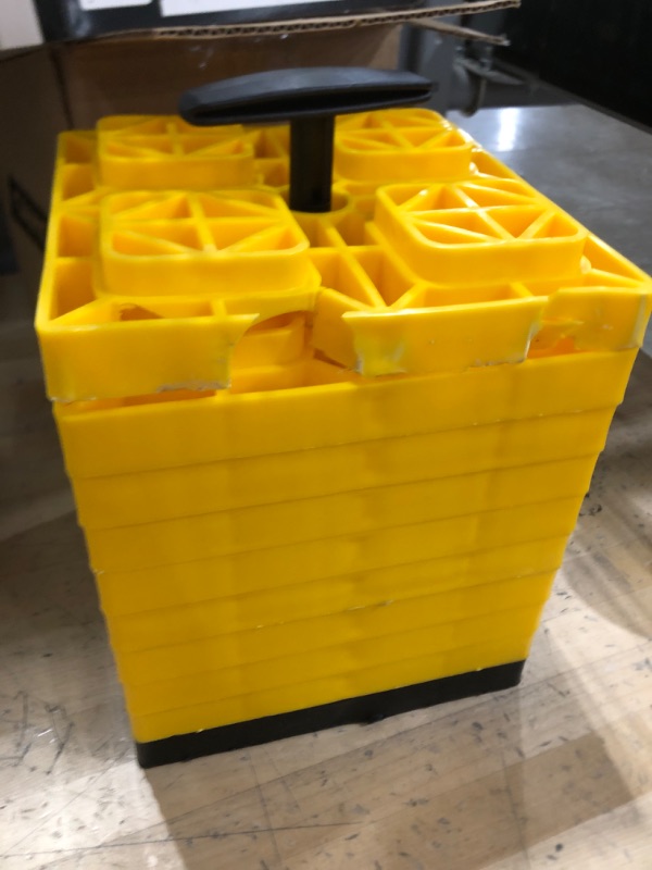 Photo 1 of Camco FasTen 2x2 RV Leveling Block For Single Tires, Interlocking Design Allows Stacking To Desired Height, Includes Secure T-Handle Carrying System, Yellow (Pack of 10) Yellow Single Tire Standard Packaging