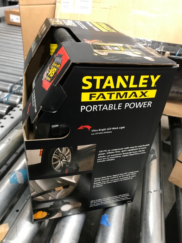 Photo 3 of **MISSING CHARGER**
STANLEY FATMAX J7CS Portable Power Station Jump Starter: 700 Peak/350 Instant Amps, 120 PSI Air Compressor, 3.1A USB Ports, Battery Clamps