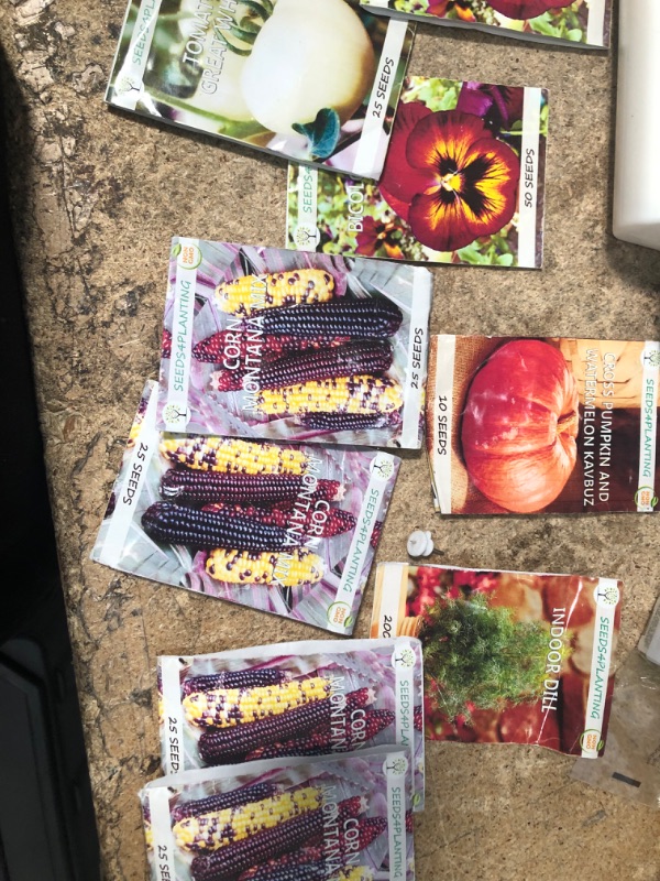 Photo 1 of 10 seed packs 