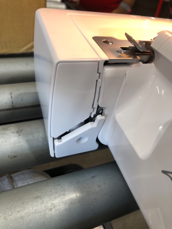 Photo 6 of *parts only* Brother Serger, 1034D, Heavy-Duty Metal Frame Overlock Machine, 1,300 Stitches Per Minute, Removeable Trim Trap, 3 Included Accessory Feet,White