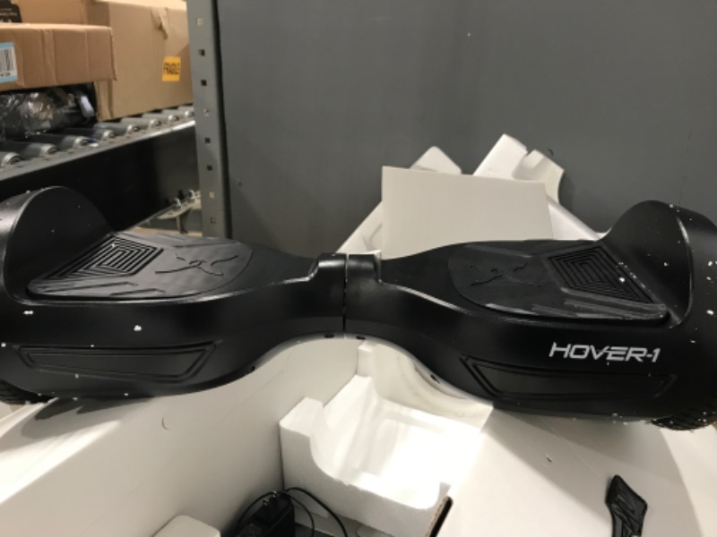 Photo 2 of * no power cord * unable to test * 
Hover-1 Drive Electric Hoverboard | 7MPH Top Speed, 3 Mile Range, Long Lasting Lithium-Ion Battery, 