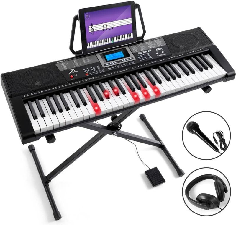 Photo 1 of **one key doesnt work** MUSTAR 61 Key Piano Keyboard, Learning Keyboard Piano with Light Up Keys, Electric Piano Keyboard for Beginners, Stand, Sustain Pedal, Headphones/Microphone, Built-in Speakers, Birthday Gifts