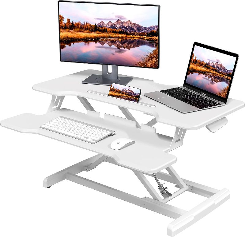 Photo 1 of 
Desk is White***Joy Seeker Standing Desk Converter 30 Inches Stand up Desk Riser, Height Adjustable Dual Tier Sit Stand Tabletop Monitor Riser Workstation for Home Office...
Color:Black
Size:30"