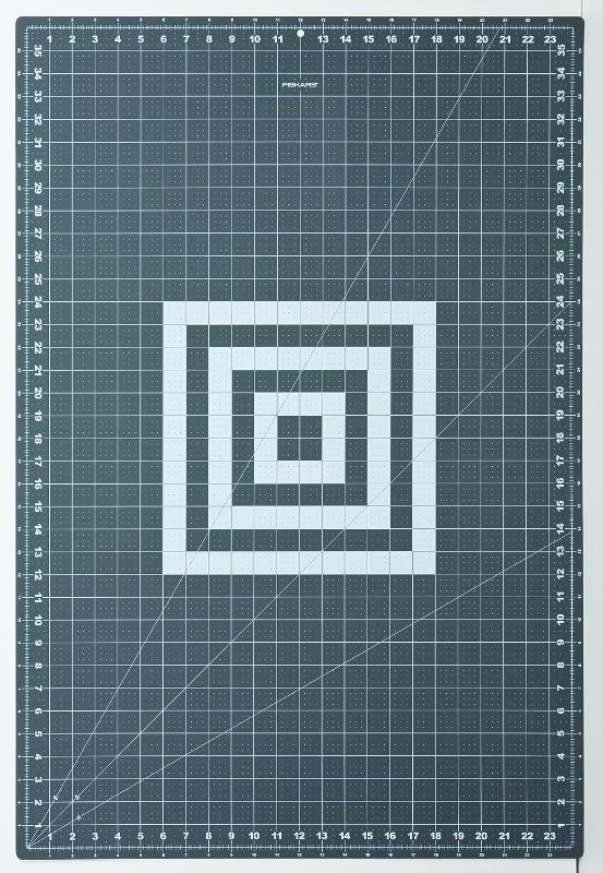 Photo 1 of Fiskars Self Healing Cutting Mat with Grid for Sewing, Quilting, and Crafts - 24"x36” Grid - Gray
