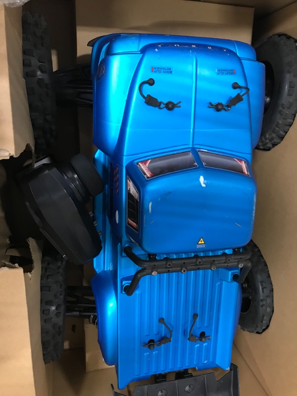 Photo 2 of ARRMA 1/8 Notorious 6S V5 4WD BLX Stunt RC Truck with Spektrum Firma RTR (Transmitter and Receiver Included, Batteries and Charger Required), Blue, ARA8611V5T2